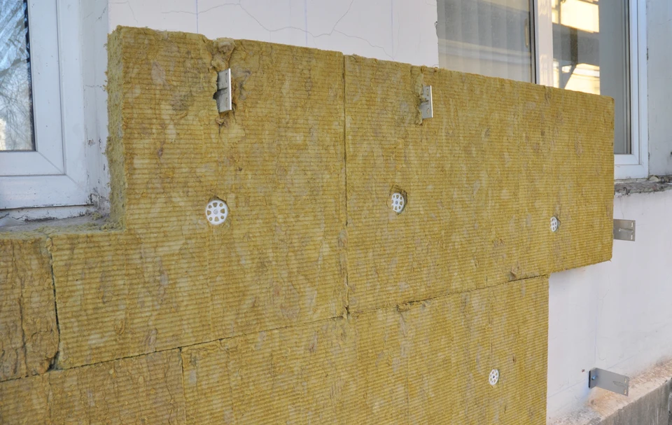 Chantier de construction r&eacute;sidentielle avec maison en cours de finition